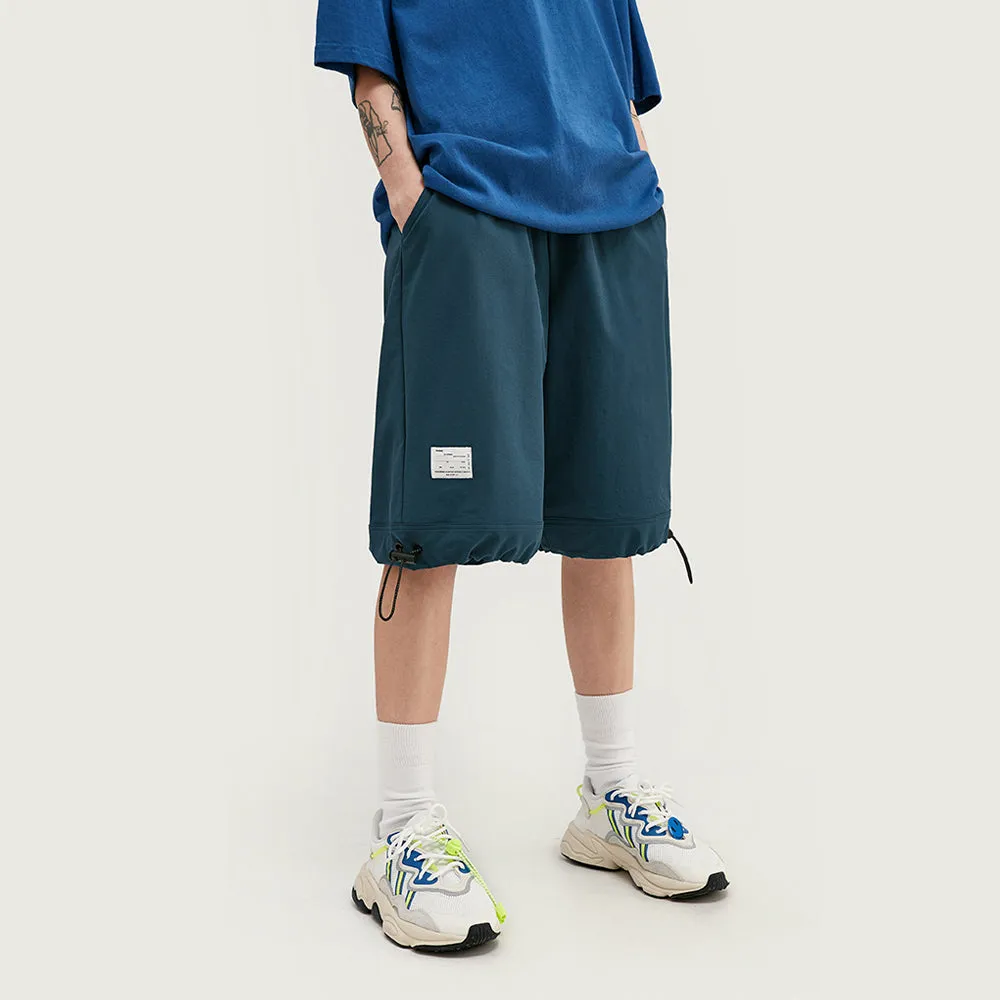WINDBREAKER STRETCH DRAWSTRING TRACK SHORTS
